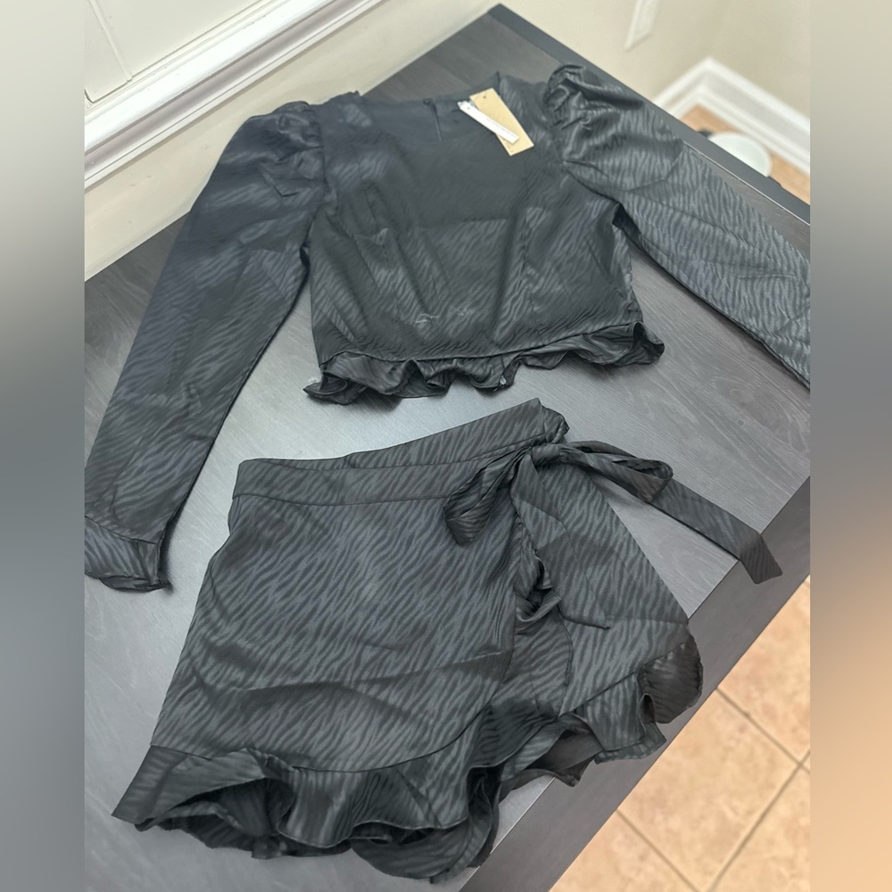 Black two piece set mini skort and blouse
